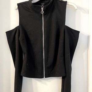 Black zip up top with shoulder cut outs